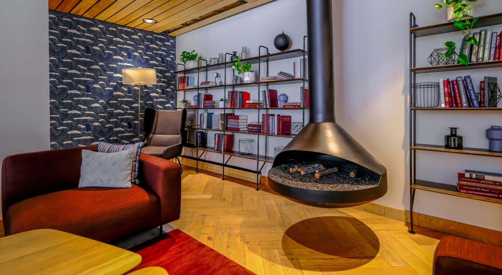 Take advantage of all Riverpoint has to offer hanging fireplace in clubroom