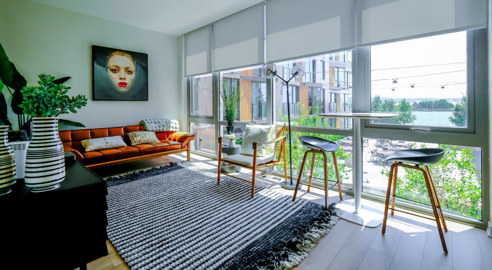 Relax and unwind in well-lit living areas floor-to-ceiling windows brighten spacious living space