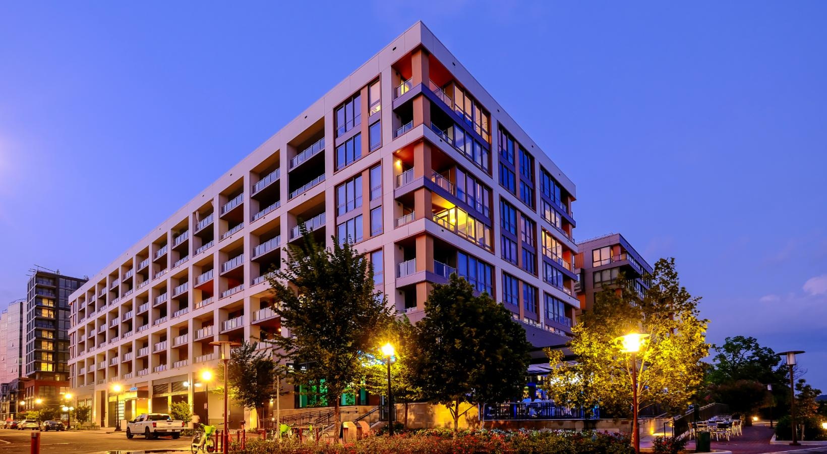 Settle into comfort at Riverpoint Riverpoint exterior lit at night