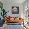living room with a large window and open spaces