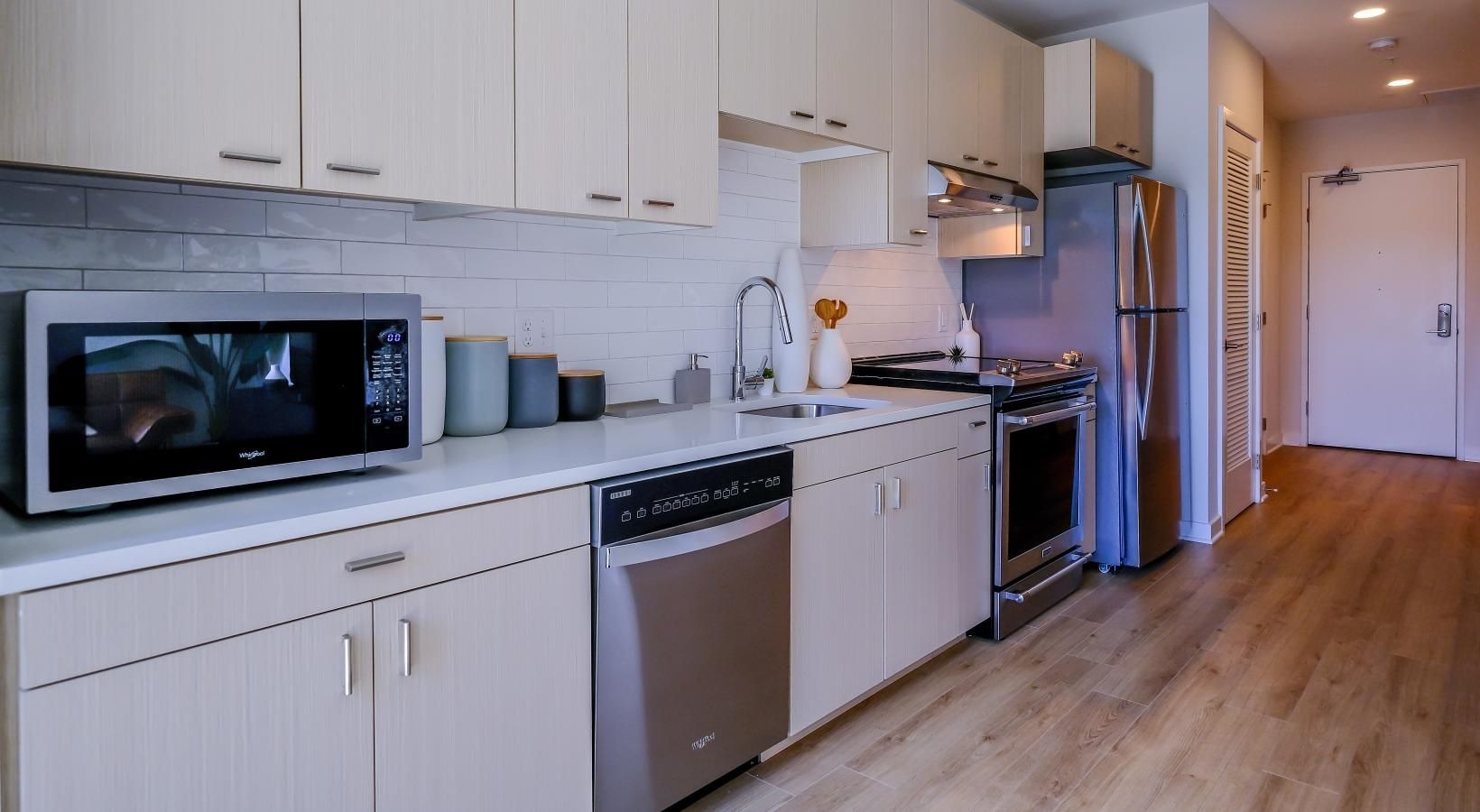 Spacious kitchens with thoughtful details long, open kitchen wall