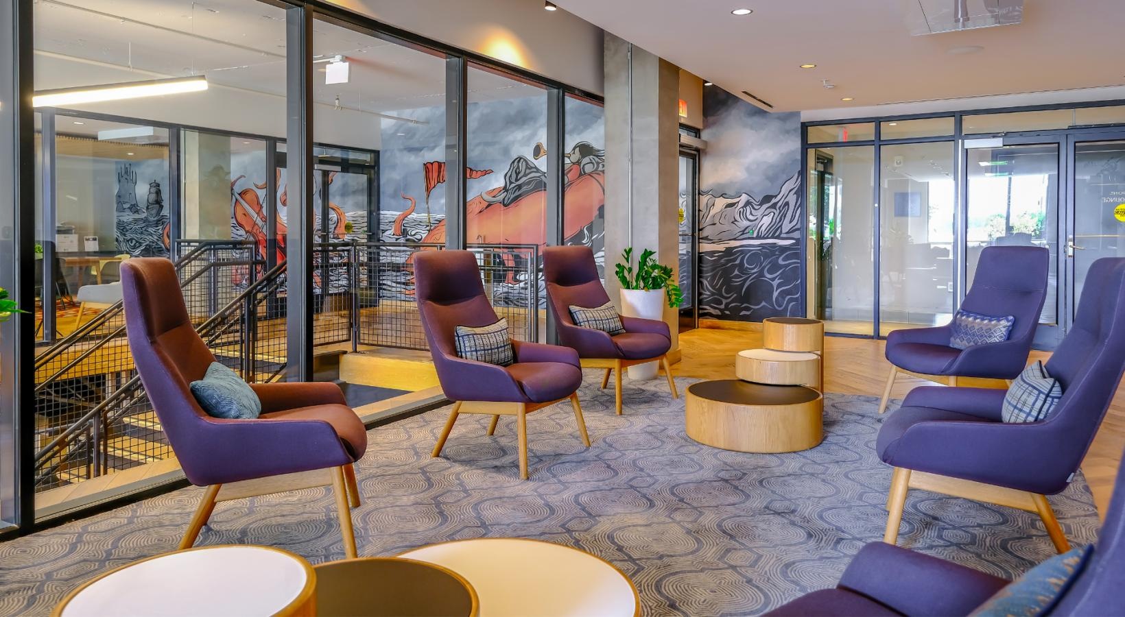 Settle into comfort at Riverpoint a room with chairs and tables