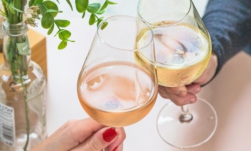 Elegance everywhere you look people holding glasses of wine